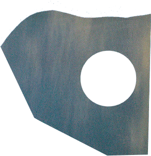 Torn grey-teal paper cutout with a circular hole